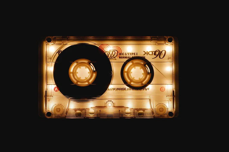 Vintage audio cassette tape on a dark background