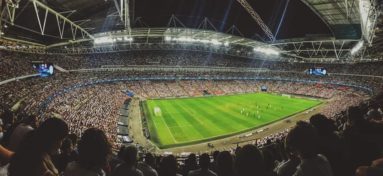 A packed soccer stadium full of fans